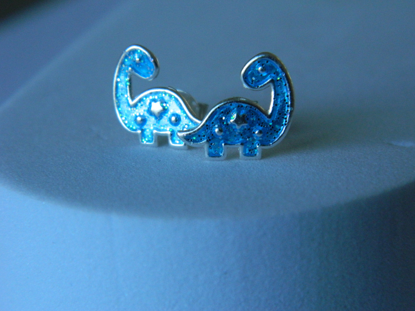 Dinosaur Studs.