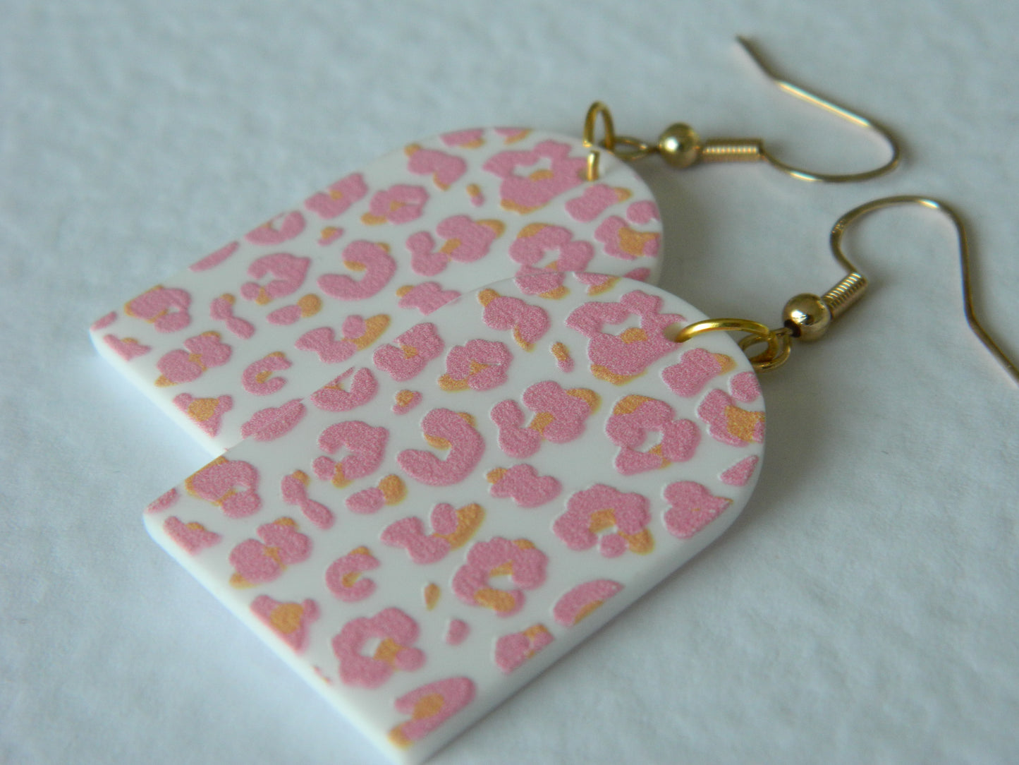 Pink Leopard Arch Dangles.