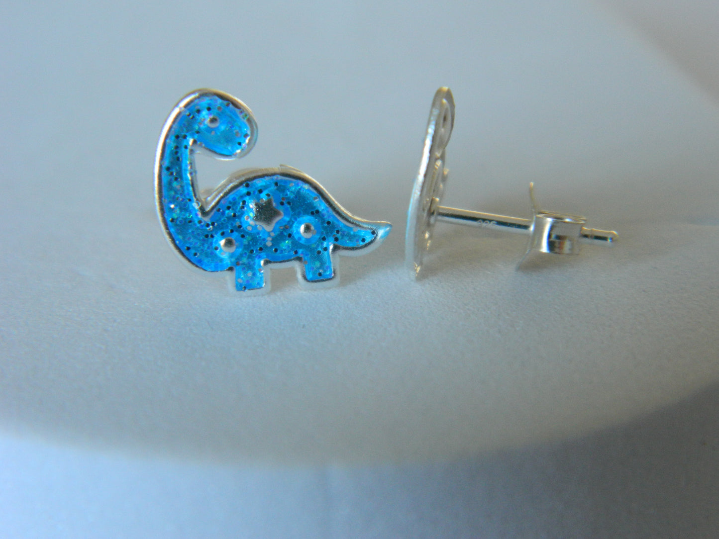 Dinosaur Studs.